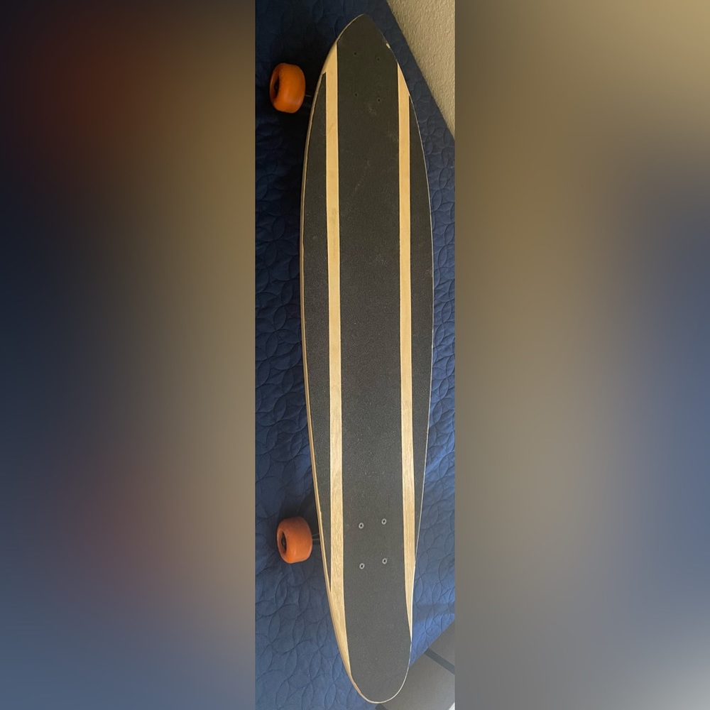 Its a AWAKEN long board, never been used before,fun to cruise around.